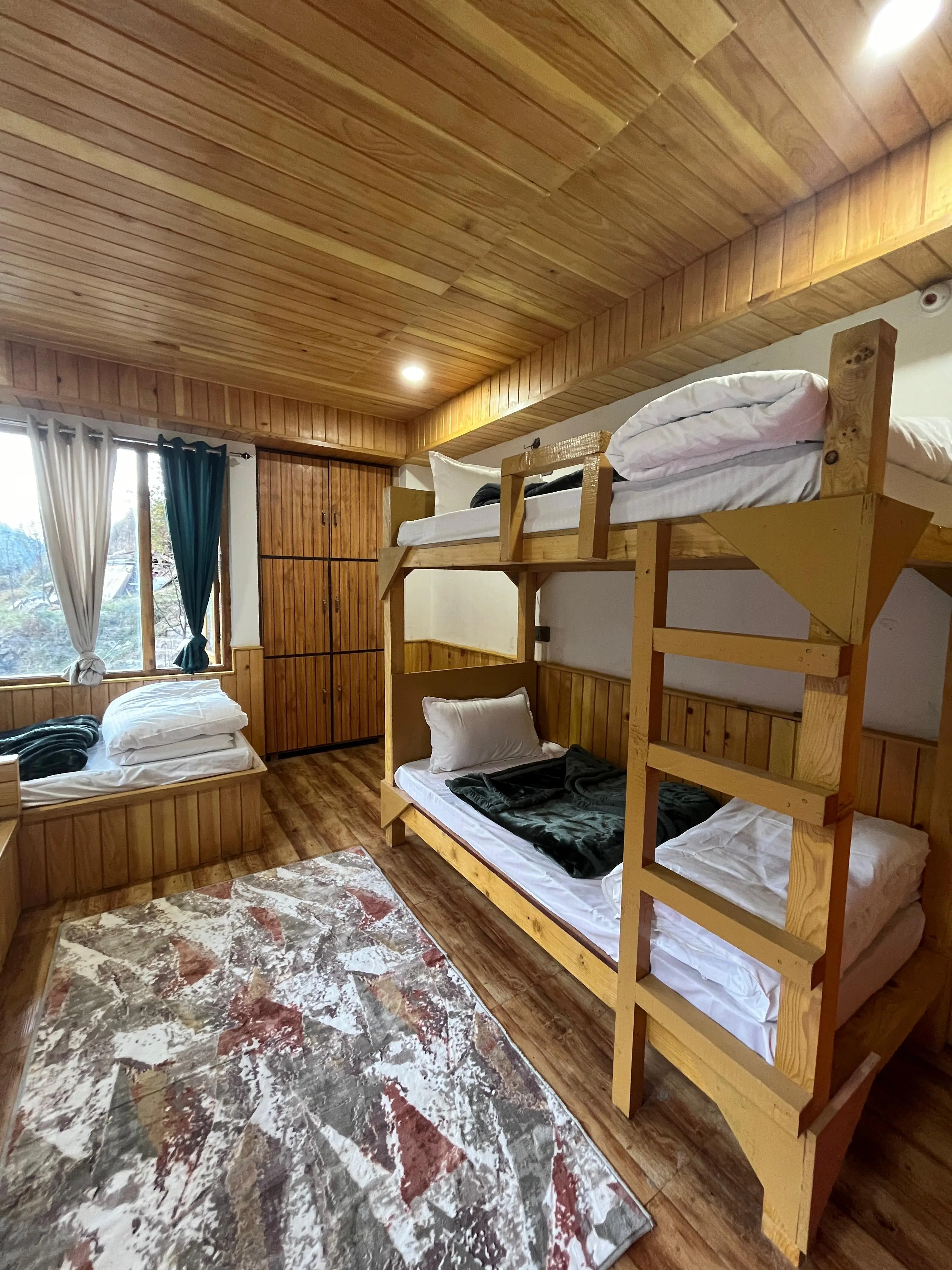 Dorm Bed at Rubaroo mountain retreat, Jibhi, Himachal Pradesh
